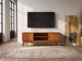 Brisighella Mid-Century Media Console under a wall-mounted screen in an industrial loft
