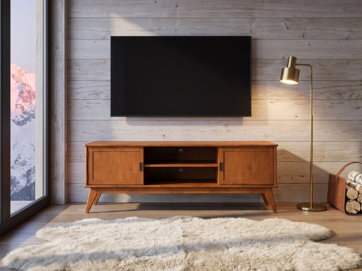 Brisighella Mid-Century Media Console under a wall-mounted screen in an alpine chalet at dusk