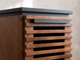 Close-up of the Buonvicino Bourbon and Black Slatted Side Table: the wooden slats and black bar pull of the door