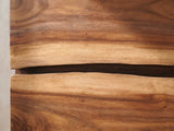 Close-up of the Burano 40-Inch Smokey Walnut 4-Drawer Chest: the wavy live edge between the top two drawers over a dark reveal