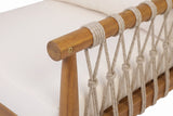 Close-up of a Burgio arm: the round teak-finish acacia rail and tapered front post, beige rope loops and knots, and the cream cushion behind