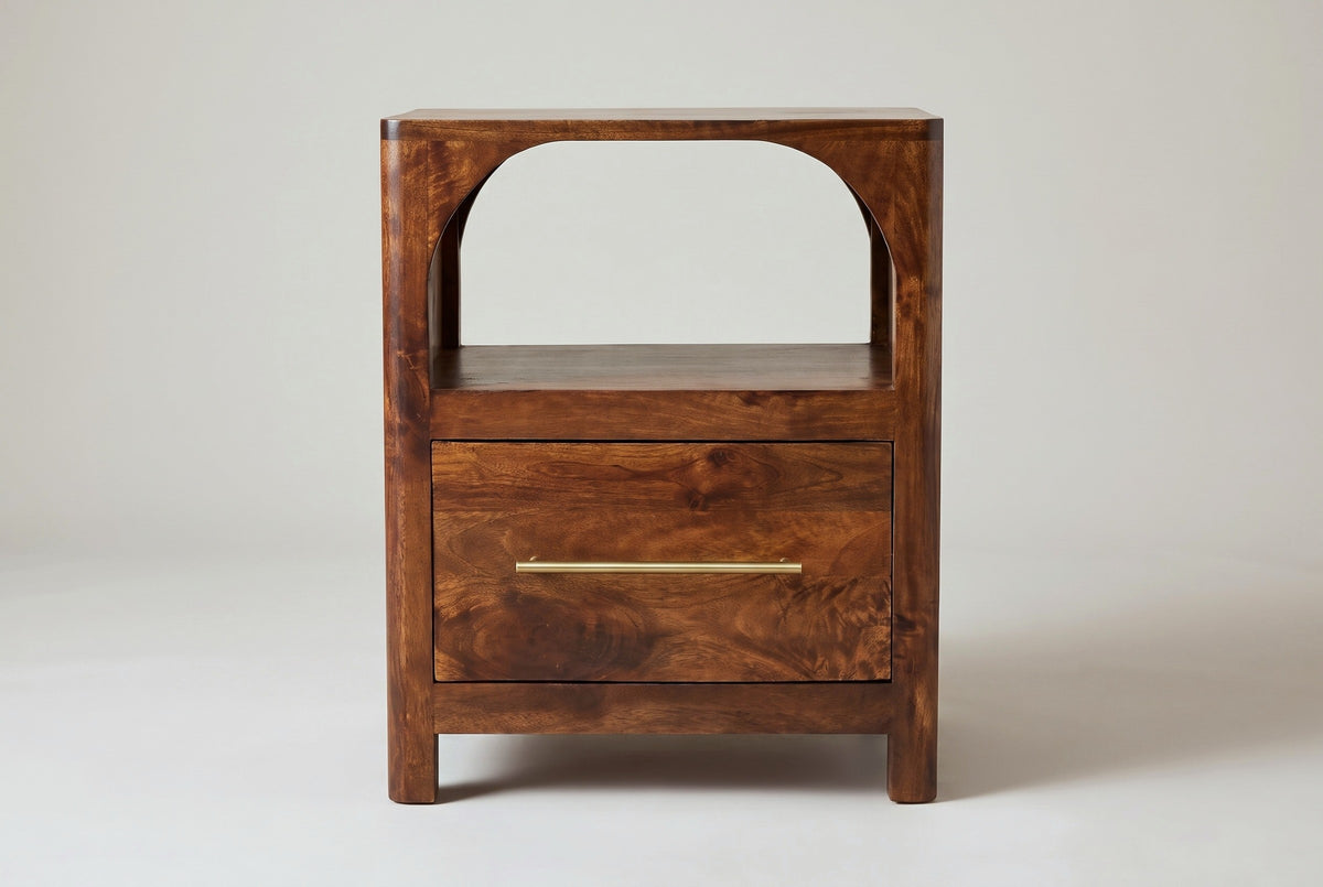 The Cabras nightstand in chestnut mango, front view on a light studio backdrop