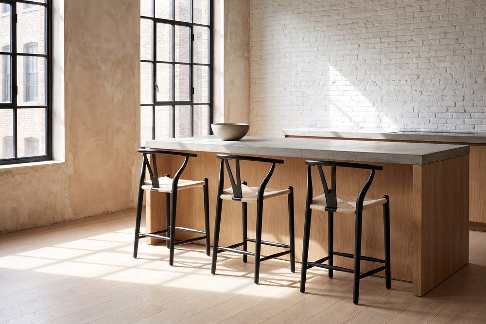 Calopezzati Y-Back Black Ash and Paper Cord Counter Stool, 24.6-Inch Seat in a city loft