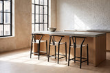Calopezzati Y-Back Black Ash and Paper Cord Counter Stool, 24.6-Inch Seat in a city loft