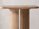 Close-up of the Campli Reclaimed Pine Split Pedestal Side Table: the rounded pine top over the split pedestal