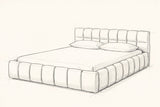 Pencil sketch of the Capracotta floor bed with a mattress and two pillows, drawn from the same three-quarter view