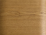 Close-up of the Cariati Ash Veneer Curved-Top Side Table: the honey-brown ash grain of the top