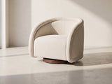 Carina swivel chair against a plaster wall in morning light
