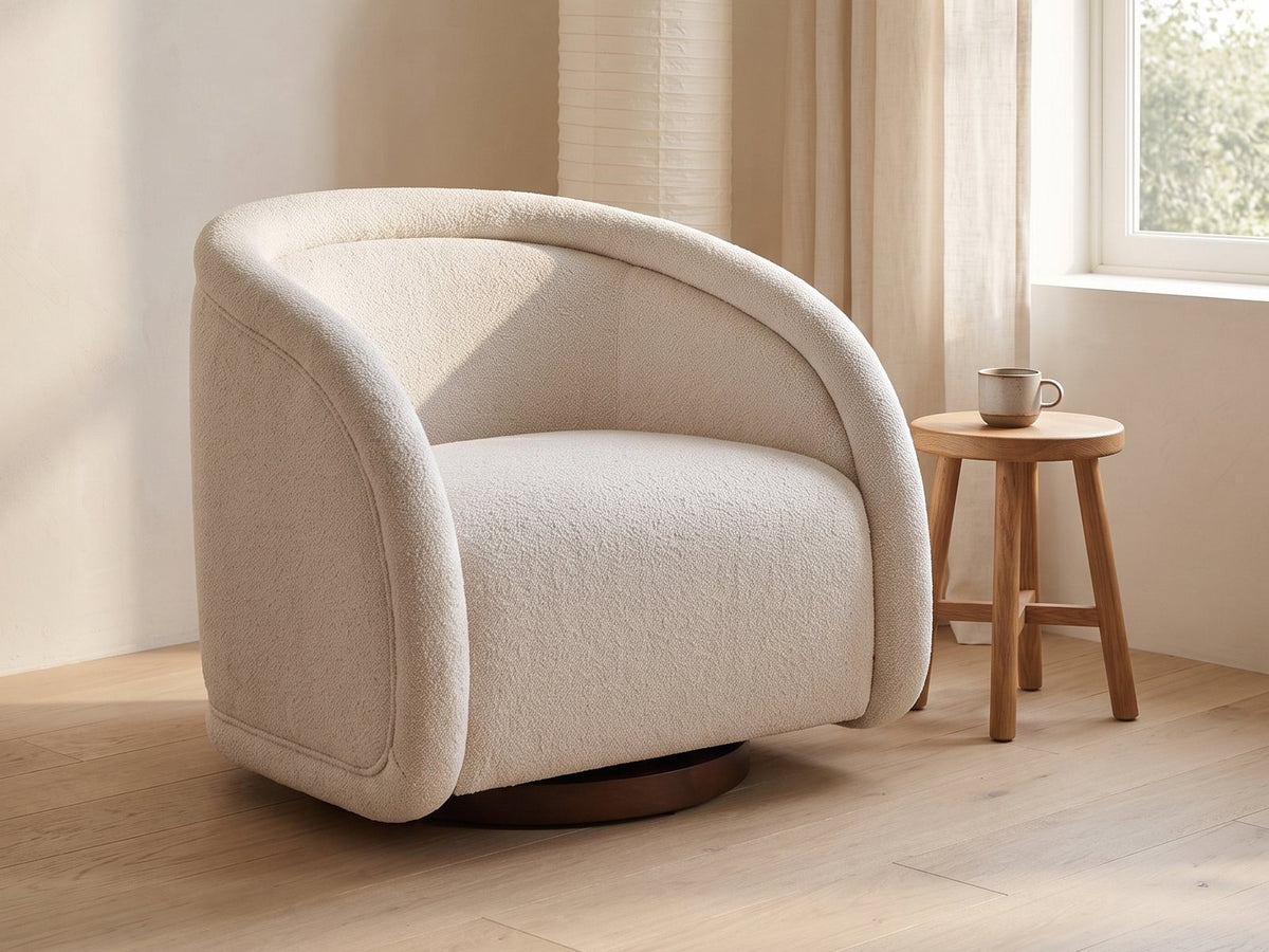 Carina swivel chair by a tall window