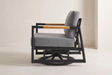 The Carini swivel glider lounge chair from the side: the open black side frame, the teak arm sleeves, two glider links and the round swivel base