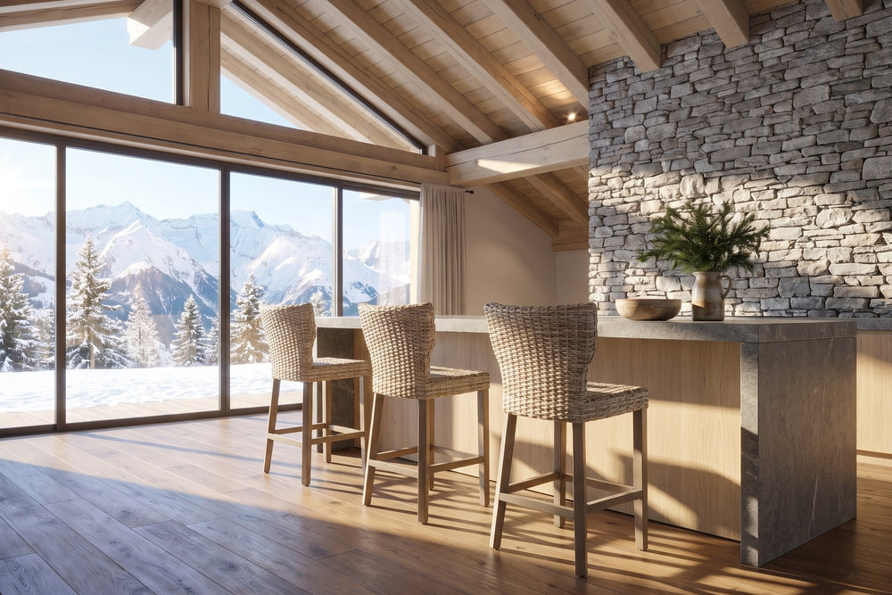 Carlopoli Wing-Back Grey Kubu Rattan Counter Stool in an alpine chalet