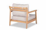 The Caronia chair from behind: two flat acacia slats between round rear posts, the back cushion tied over the top slat