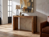 Carosino Solid Sheesham Waterfall Console Table against a plaster wall in an industrial loft