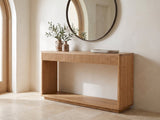 Carovigno Fluted Wood Veneer Console Table under a round mirror in a travertine entryway