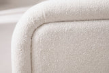 Close-up of the white boucle on the Casacalenda bed: small curly loops at the rolled edge of the headboard border