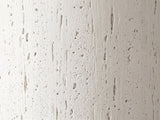 Close-up of the Casarano Fiber Concrete Hourglass Side Table: the travertine-like cast texture of the column