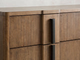 Close-up of the Castelfranco 65.5-Inch Ash Brown Reeded 6-Drawer Dresser: the reeded ash drawer fronts beside a flat strip with its black bar pull