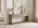 Castellaneta Knotty Oak Veneer Console Table against a plaster wall under an abstract canvas in a bright living room