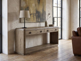 Castellaneta Knotty Oak Veneer Console Table against a plaster wall in an industrial loft