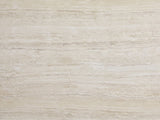 Close-up of the Castellina Faux Travertine Fiberglass Block Coffee Table: the vein-cut travertine look of the top