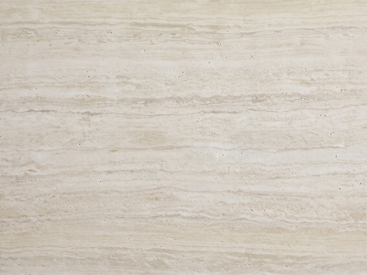 Close-up of the Castellina Faux Travertine Fiberglass Block Coffee Table: the vein-cut travertine look of the top