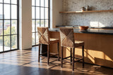 Castrolibero Woven Natural Fiber and Dark Wood Counter Stool in a city loft