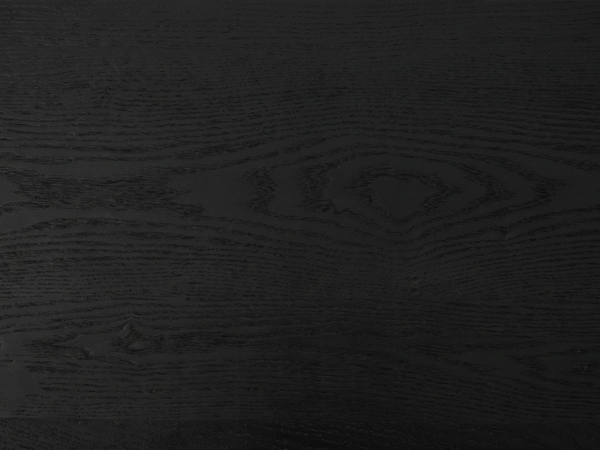 Close-up of the Cellamare Black Ash Veneer Waterfall Console Table: the open ash grain under the matte black finish