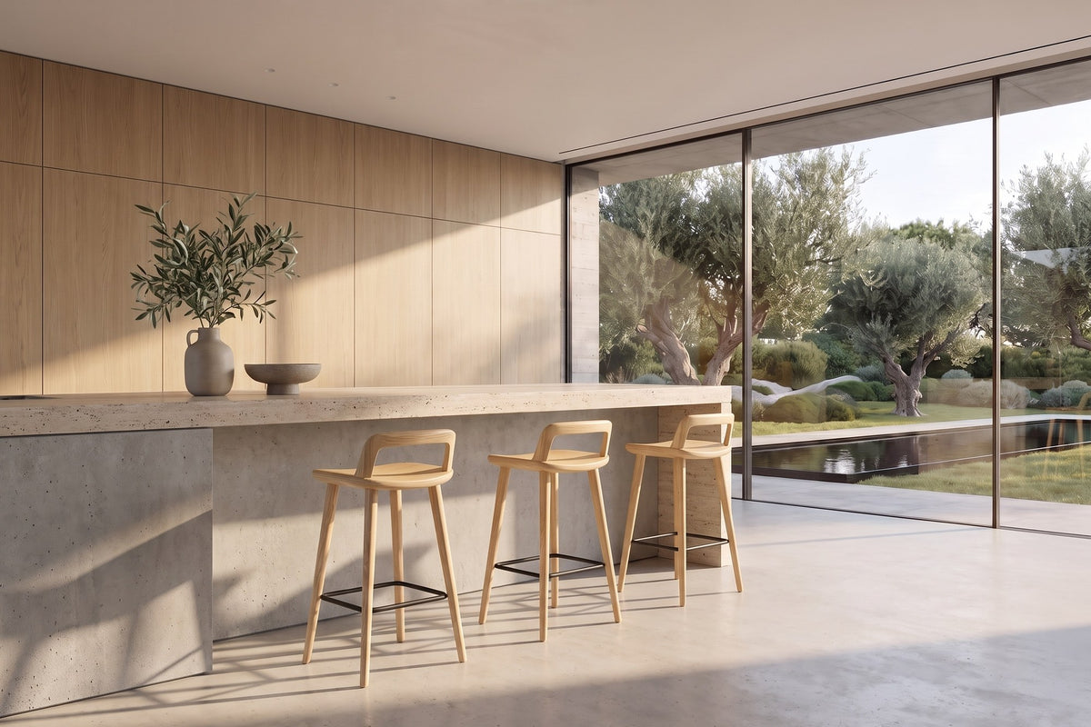 Cervicati 26.5-Inch Solid Ash Low-Back Counter Stool in a sunlit villa dining room