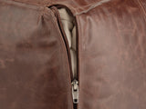 Close-up of the Cervo Distressed Brown Genuine Leather Square Pouf: zip