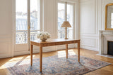 Cessaniti 63-Inch 1-Drawer Reeded Rubberwood Writing Desk in a Paris salon