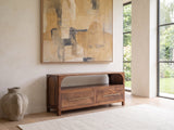 Cherasco Arch Mango Media Console seen from the side, under a large abstract painting in a bright living room