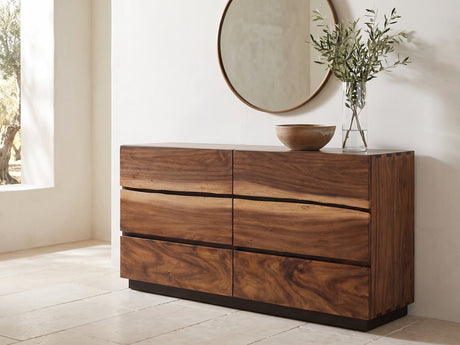 Chioggia 64-Inch Smokey Walnut 6-Drawer Dresser under a round bronze mirror in a villa bedroom