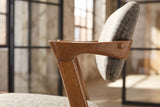 Close-up of the Cirella Mid-Century Z-Frame Walnut Finish Fabric Dining Chair (Set of 2): arm