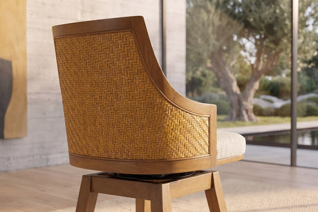 Close-up of the Cleto 26-Inch Woven Cane and Wood Swivel Counter Stool: cane