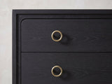 Close-up of the Cologna 40-Inch Peppercorn 5-Drawer Chest: an antique-brass ring pull on a peppercorn elm drawer front