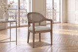 Corigliano Cane-Back Solid Oak Dining Chair in a Paris salon