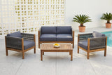 Corleone acacia conversation set on a terrazzo pool terrace in front of a white breeze-block screen wall, with potted sago palms (bowl of lemons not included)
