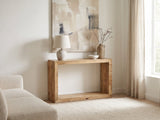 Crispiano Mango Wood Open Frame Console Table against a plaster wall under an abstract canvas in a bright living room