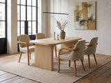 Cropani 69-Inch Rectangular Fluted Dining Set with 4 Arm Chairs in an industrial loft dining area