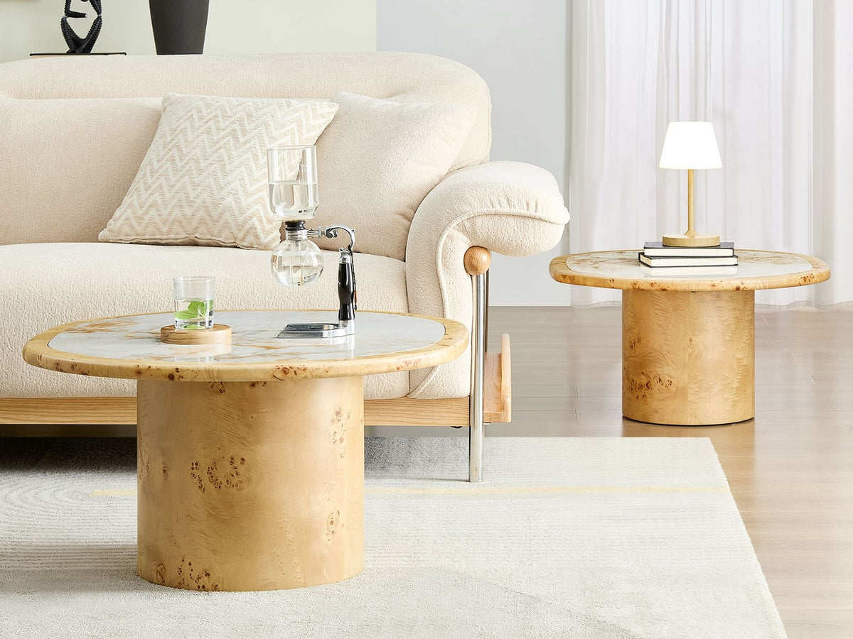 Cuneo 29-Inch Pebble Burl Veneer and Sintered Stone Coffee Table Set used apart: one table in front of a cream sofa, the other beside it as a side table