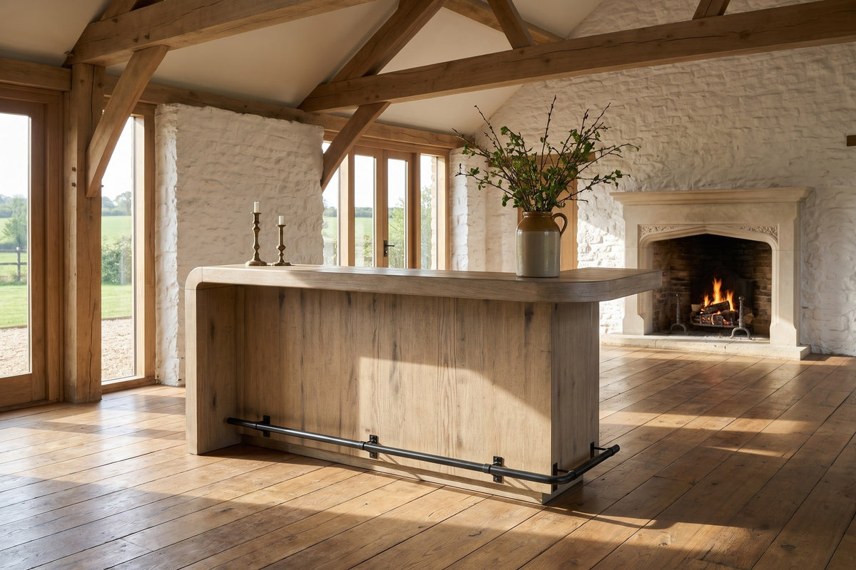 Firmo 78-Inch 2-Drawer Knotty Oak Veneer Counter-Height Home Bar with Footrest in a converted barn