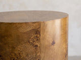 Close-up of the Fiumefreddo Walnut Burl Oval Pillar Side Table: the crisp edge where the oval burl top meets the side