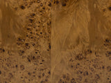 Close-up of the Fiumefreddo Walnut Burl Oval Pillar Side Table: the walnut burl veneer of the oval top