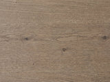 Close-up of the Fonzaso 66-Inch Weathered Knotty Oak 6-Drawer Dresser: the weathered knotty oak grain of a drawer front