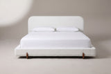 Fossacesia bed in white textured fabric with a white mattress and pillows (not included), front view