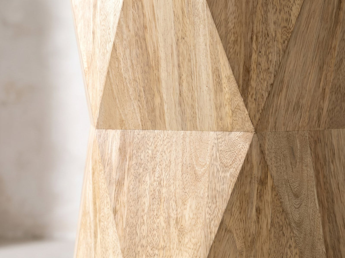 Close-up of the Gallicano Mango Faceted Hexagon Side Table: the triangular mango facets meeting at the waist