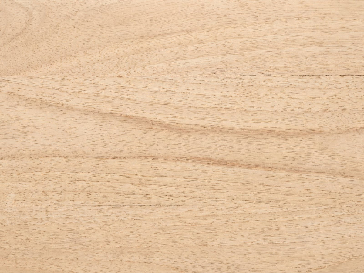Close-up of the Gallicano Mango Faceted Hexagon Side Table: the natural mango grain of the hexagonal top