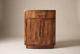 The Gavoi nightstand in mocha mango, front view on a light studio backdrop