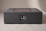 The Gela fire pit seen from the front: the flat front face with the control niche in the middle and the low base