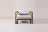 The Giardini lounge chair from the front: two side frames standing on their runners, the front seat rail and the gray seat and back cushions